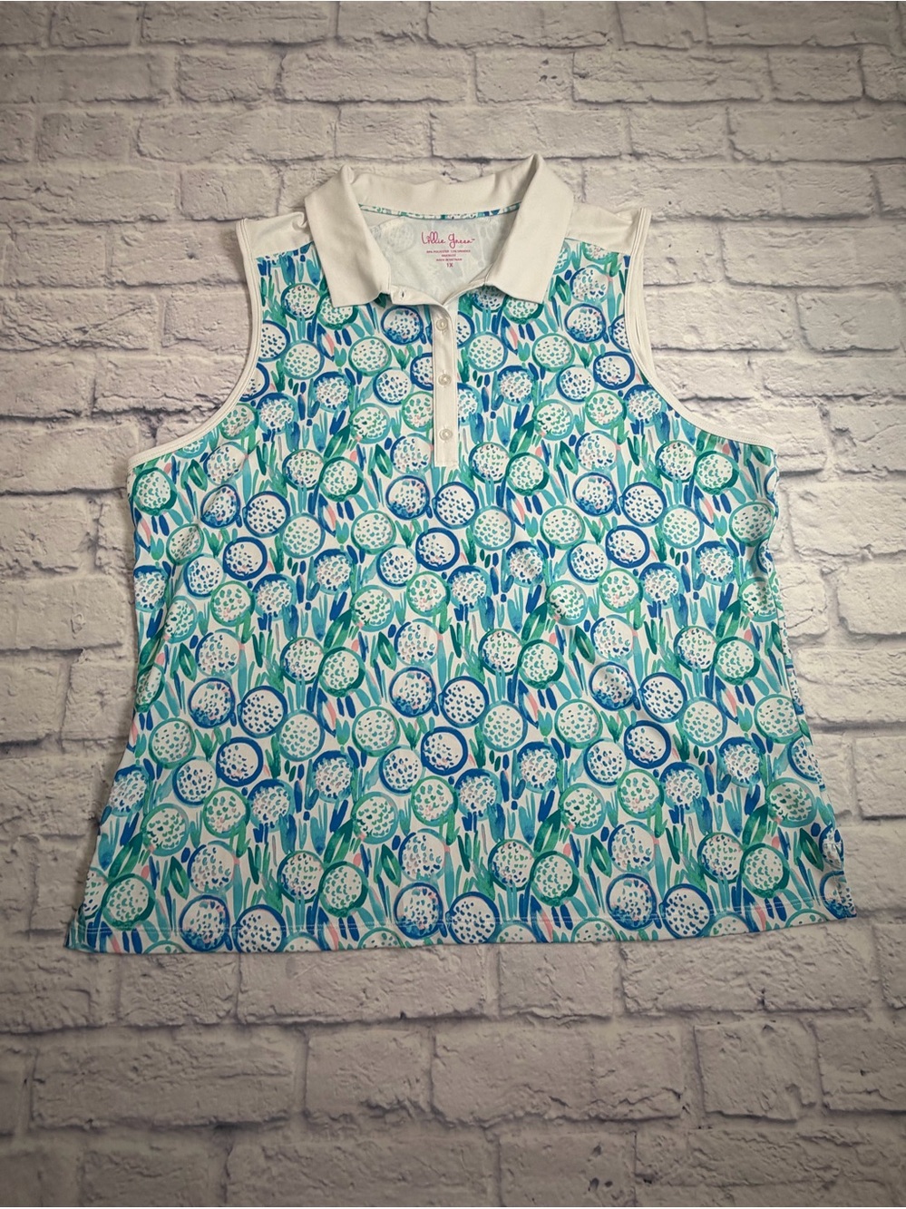 Lillie Green Sleeveless  Polo in White/Blue/Pink  Floral Golf Ball Print. XL.
